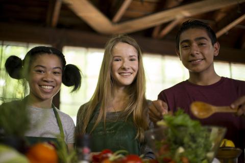 Youth cooking healthy food